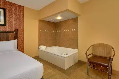 jacuzzi next to bed