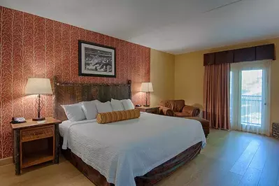 A King bed at the Old Creek Lodge in Gatlinburg.