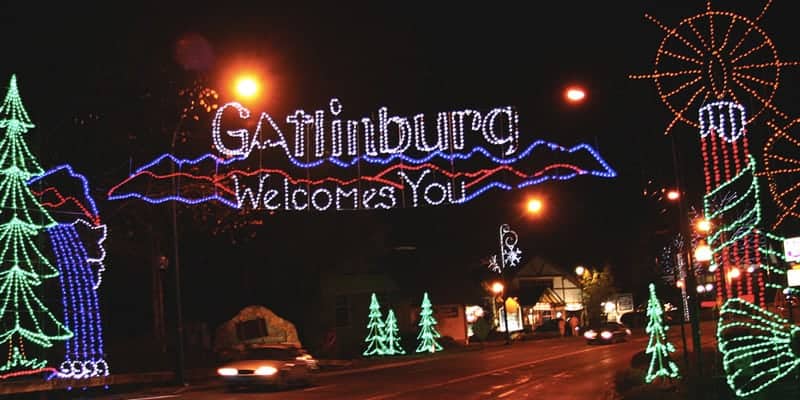 christmas lights at the beginning of gatlinburg that say gatlinburg welcomes you