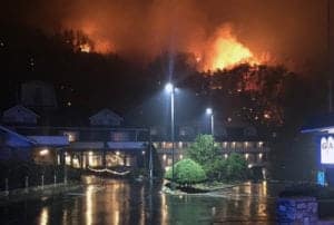 A wildfire burns on a hillside after a mandatory evacuation was ordered in Gatlinburg, Tennessee in a picture released November 30, 2016. Tennessee Highway Patrol/Handout via REUTERS ATTENTION EDITORS - THIS IMAGE WAS PROVIDED BY A THIRD PARTY. EDITORIAL USE ONLY - RTSTVY9